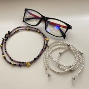 Akiniai ir akinių rėmelių laikikliai